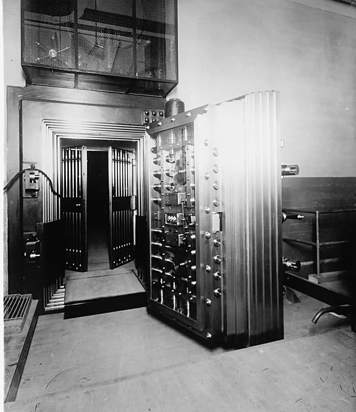 Photograph of a twelve-ton steel vault door standing open at the Bureau of Engraving and Printing.